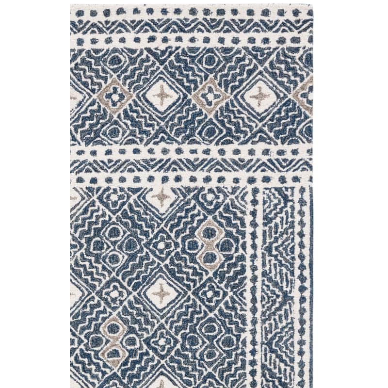 SAFAVIEH Handmade Micro-Loop Lutetia Wool Rug
