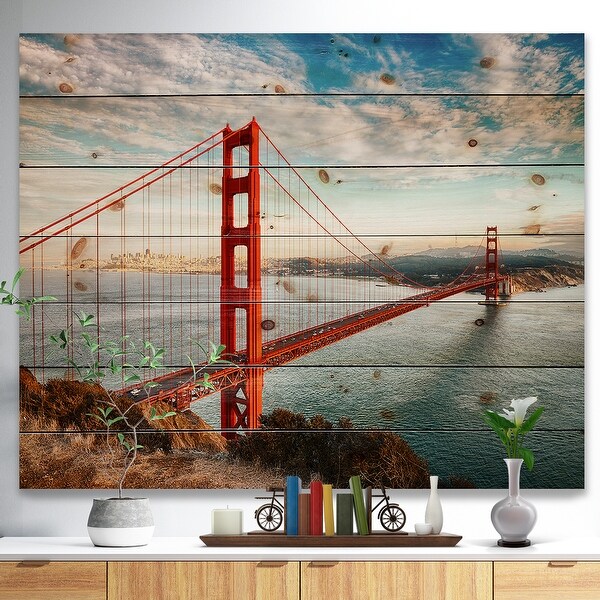 Designart 'Golden Gate Bridge in San Francisco' Sea Bridge Print on Natural Pine Wood - Blue. Opens flyout.