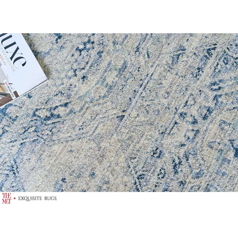 The Met X Exquisite Rugs Vintage Looms Light Blue/Blue Area Rug.