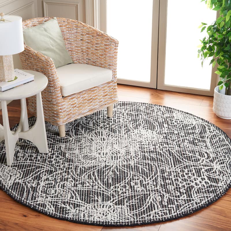 SAFAVIEH Handmade Ebony Dita Modern Floral Wool Rug - 6' Round - Black/Ivory