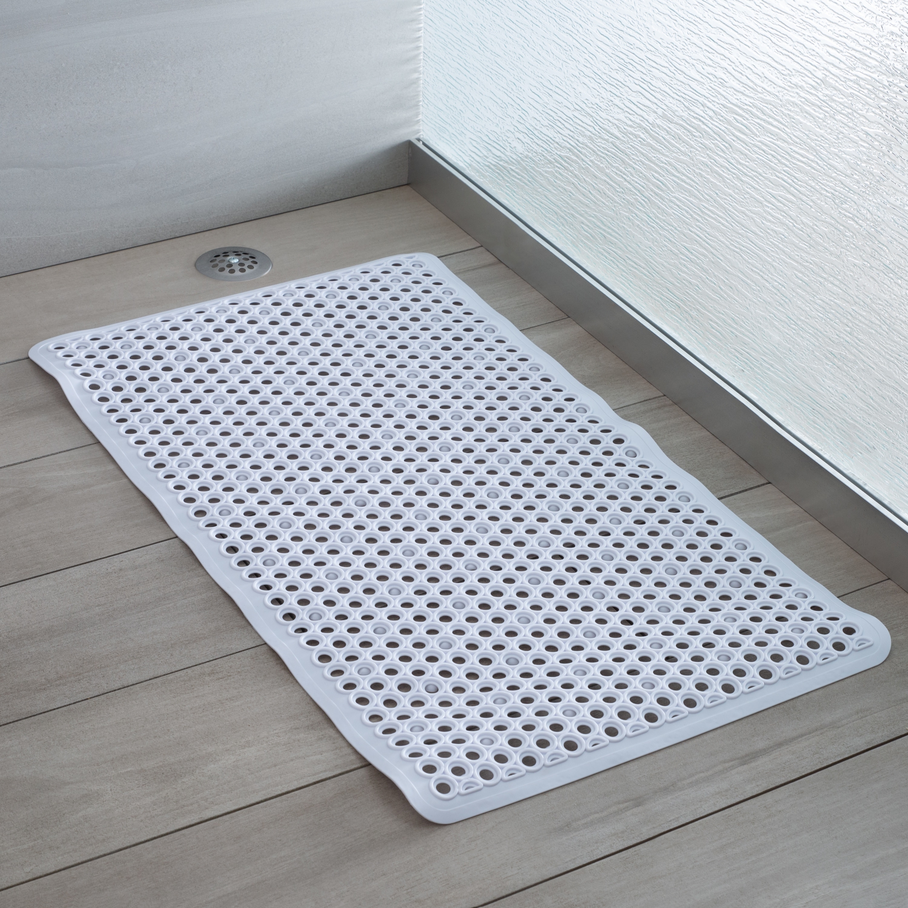 https://ak1.ostkcdn.com/images/products/is/images/direct/e38c5cb911e5928b6a3d126aae3b99349a3aeac5/Bath-Bliss-Self-Draining-Bath-Mat.jpg