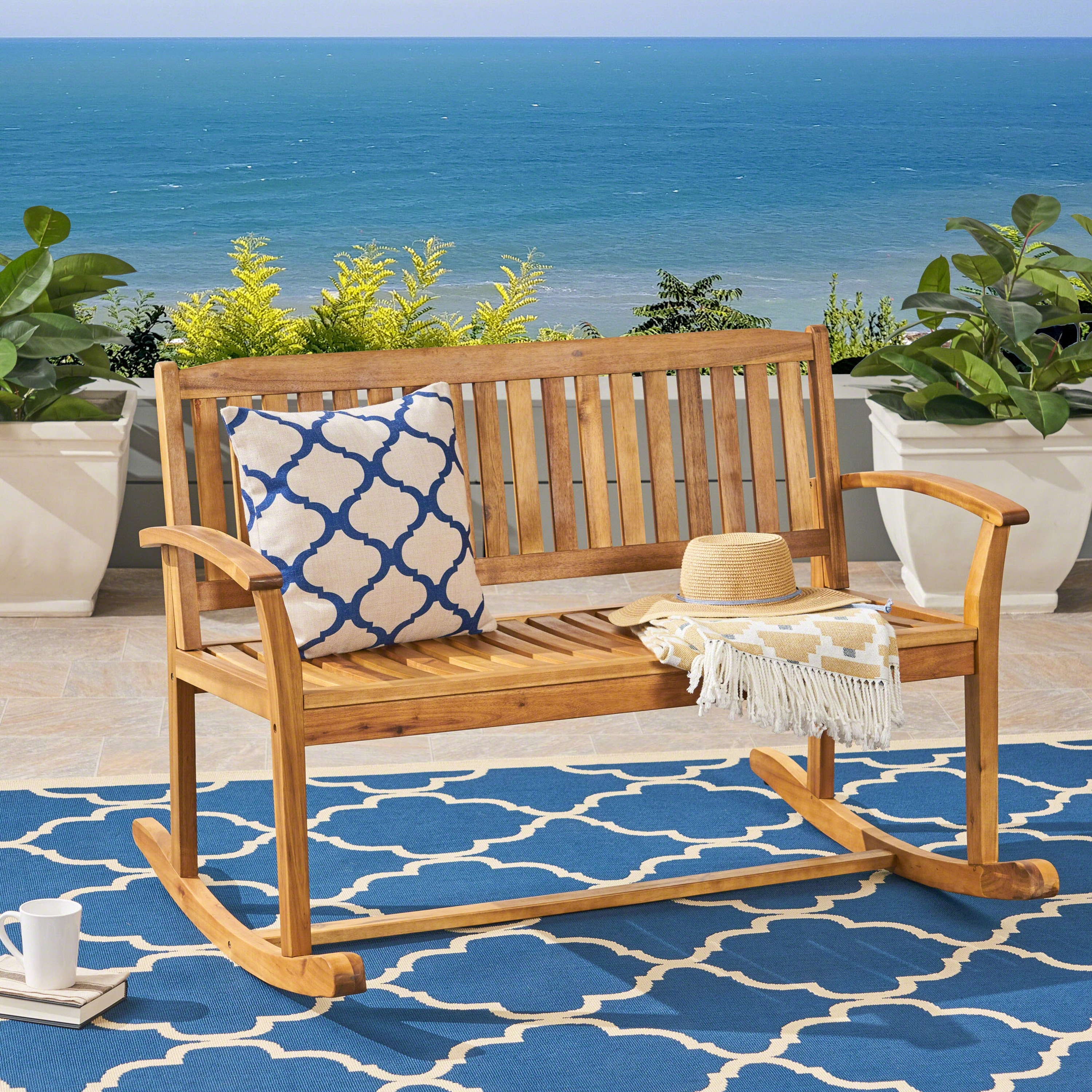 Roomfitters Outdoor Wooden Rocking Loveseat with Slatted Backrest, Wide Armrests and Classic Curved Base