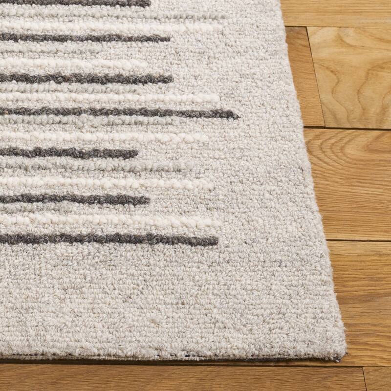 SAFAVIEH Handmade Ebony Isaure Modern Striped Wool Rug