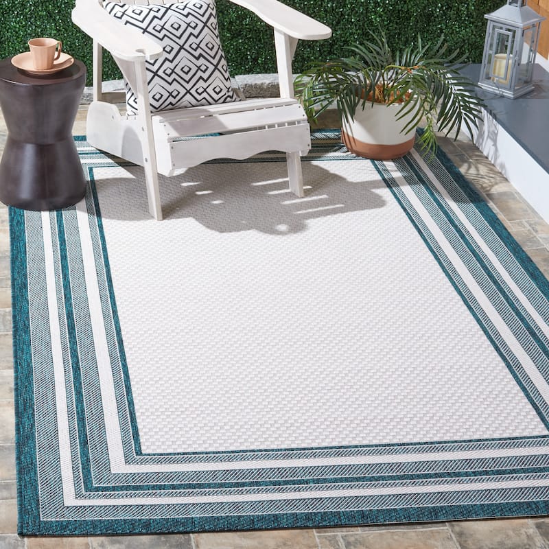 SAFAVIEH Courtyard Vickie Indoor/ Outdoor Waterproof Patio Backyard Rug - 10' x 14' - Ivory/Teal