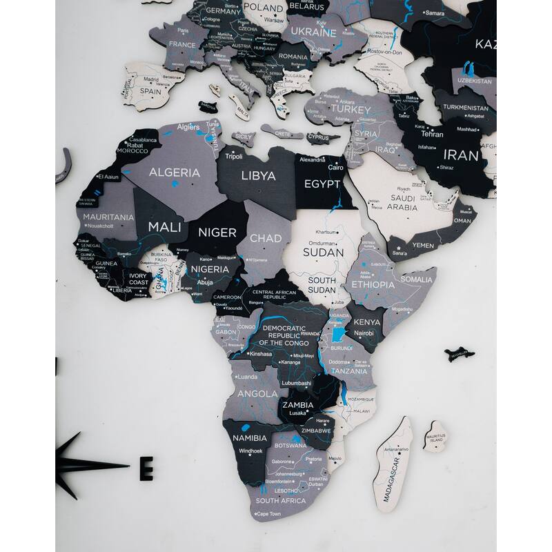 HomeRoots 24" X 39" Black Gray and White Wood World Map Hanging Dimensional Sculpture