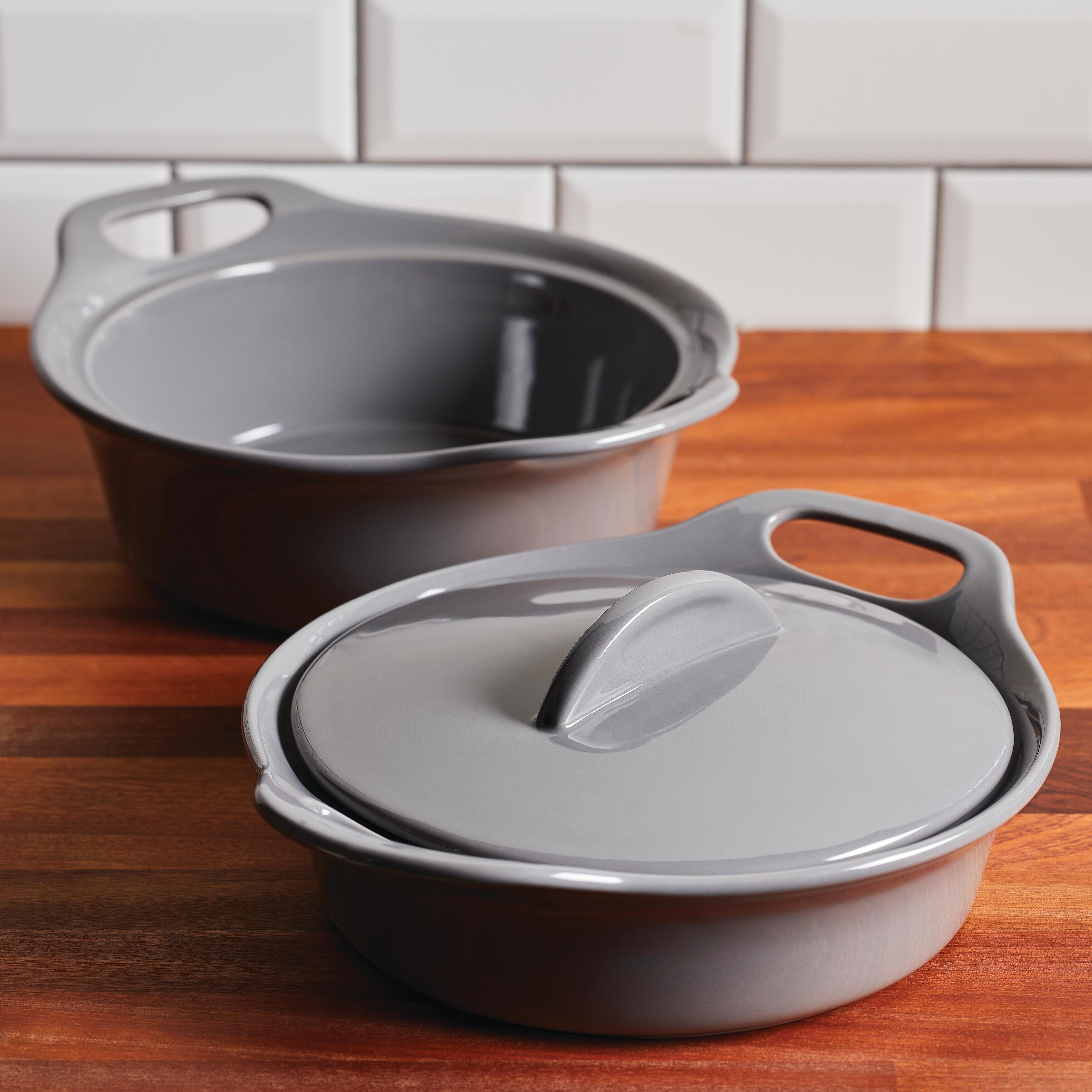 https://ak1.ostkcdn.com/images/products/is/images/direct/e4283e2f85e44d89f70b49b7f069d5df8d794b57/Rachael-Ray-Ceramic-Casserole-Bakers-with-Shared-Lid-Set%2C-3-Piece%2C-Dark-Gray.jpg