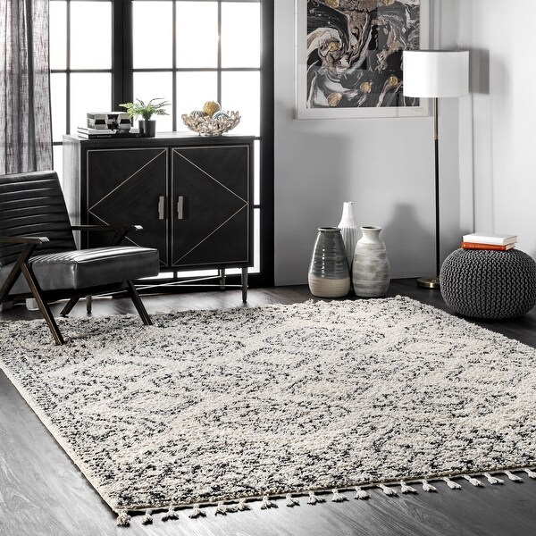 nuLOOM Boho Soft and Plush Geometric Moroccan Shag Tassel Area Rug. Opens flyout.