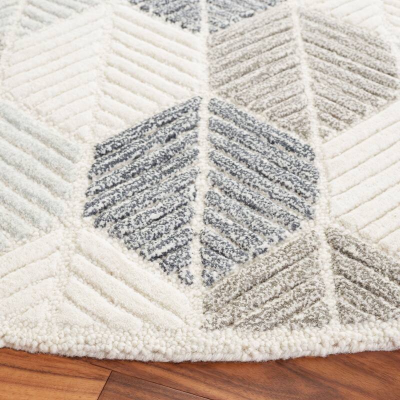 SAFAVIEH Handmade Ebony Sidonie Modern Wool Rug