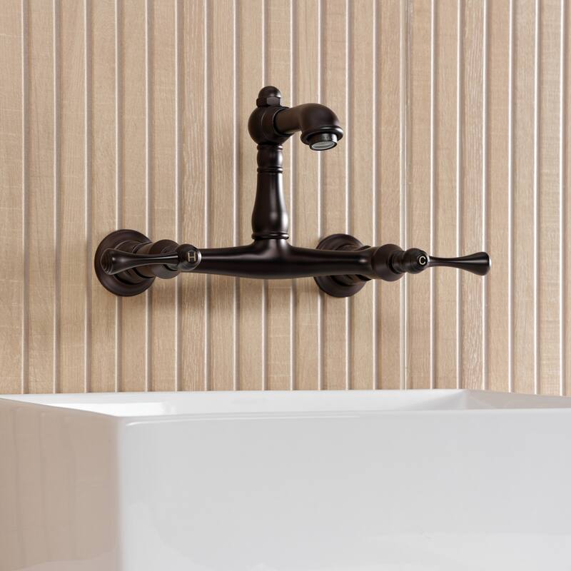 Kingston Brass English Country Two-Handle 2-Hole Wall Mount Bathroom Faucet