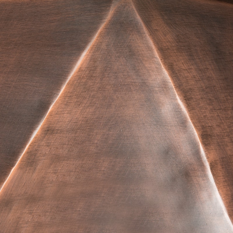SAFAVIEH Astrid Faceted Copper Coffee Table - 31" x 15.5" x 31"