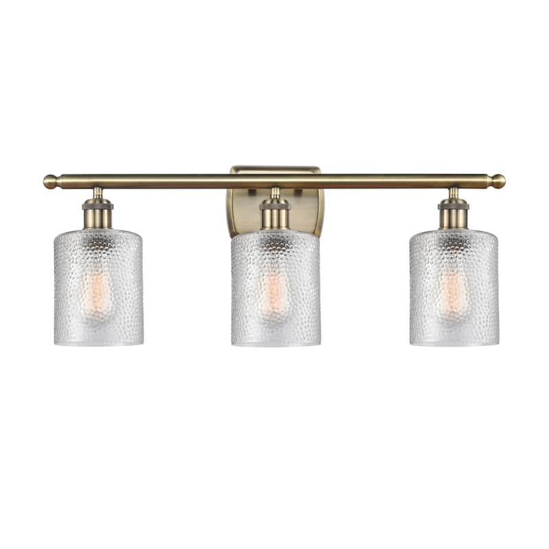 Innovations Lighting 516-3W-10-26 Cobbleskill Vanity Cobbleskill 3 - Clear / Antique Brass