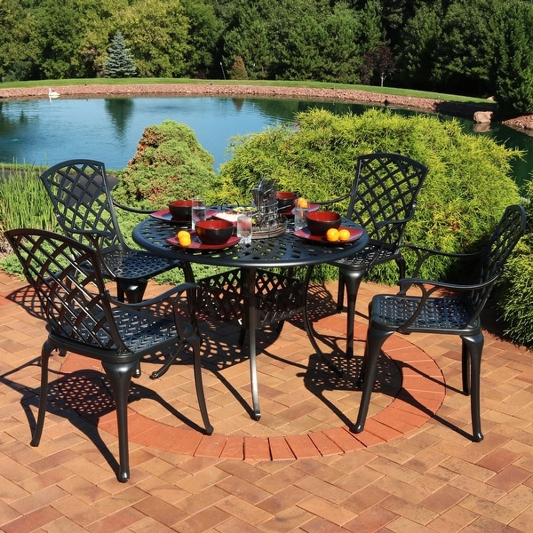 Rod iron table and chair set sales