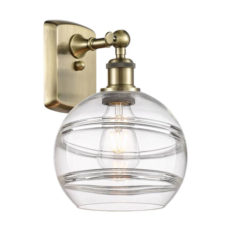 Innovations Lighting 516-1W-11-8 Rochester Sconce Rochester 11" Tall - Antique Brass / Clear