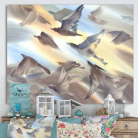 Designart "Flock Of Birds Flying On Pastel Background Silhouttes Of Wings I" Lake House Canvas Wall Art Print