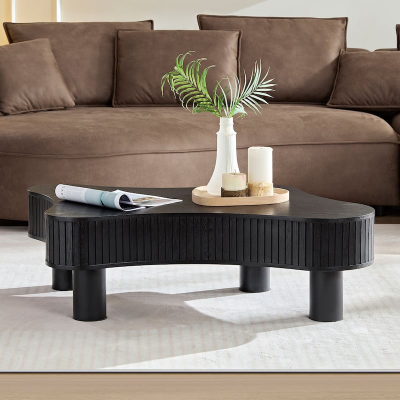 Modern Irregular Shaped Coffee Table Compact Wooden Accent Table with Side Vertical Stripe Fluted Decor and Wood Grain Surface - Black