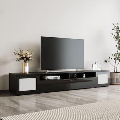 Modern 83-Inch TV Stand with LED Lighting, Rattan Accents, and Ample Storage - Fits TVs up to 110 lbs.