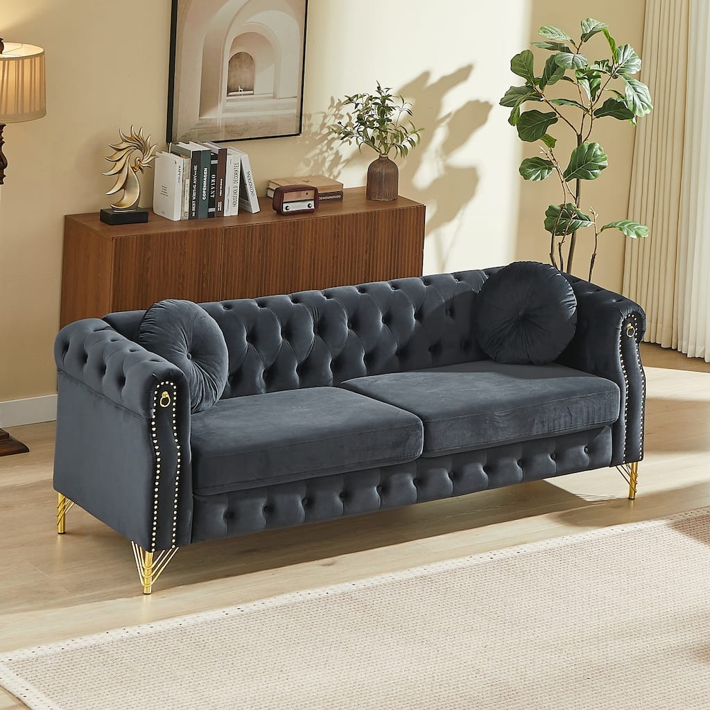 Chesterfield Sofa with Two Round Pillows, Featuring Copper Stud Detailing and Tufted Button Accents