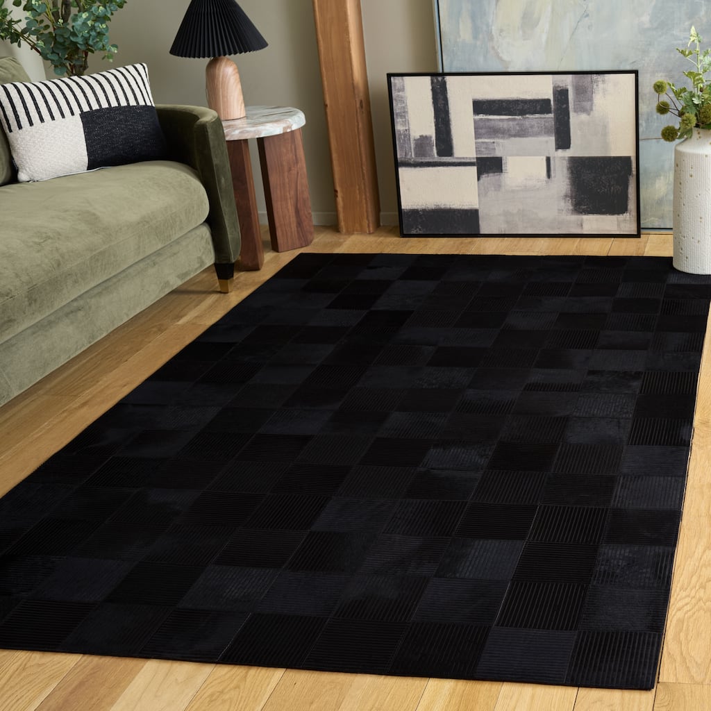 SAFAVIEH Hand-Woven Studio Leather Magga Modern & Contemporary Leather Rug