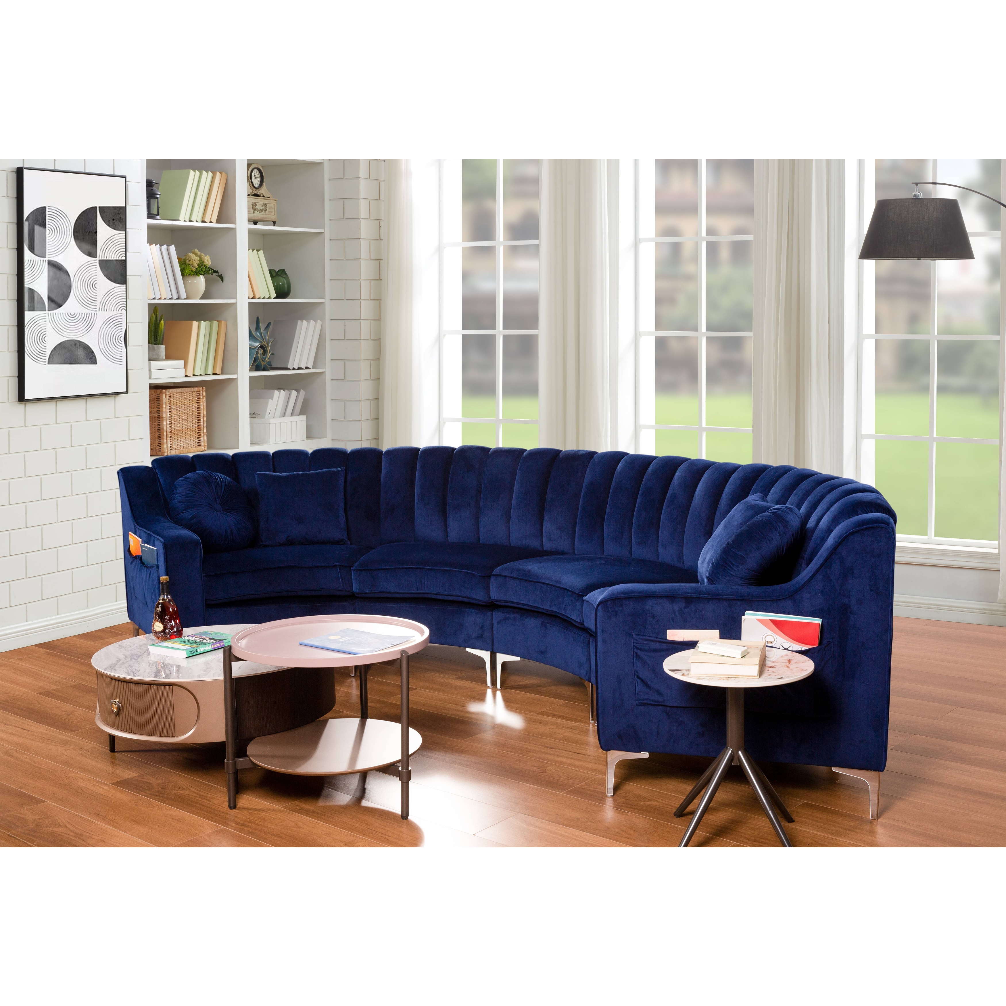 Curved blue deals velvet sofa