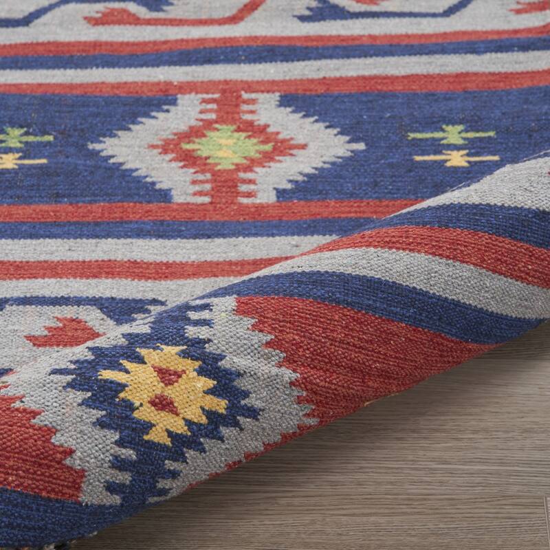 Fuqe Southwestern Woven Low Pile with Fringe Area Rug By HomeRoots - 66' X '42' X '0.25