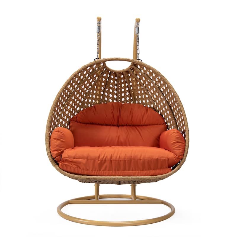 LeisureMod Mendoza 2-Person Hanging Egg Swing Chair - Handcrafted Light Brown Wicker, Patio Hammock Lounger with Cushions - 53"