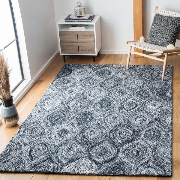 SAFAVIEH Handmade Ikat Madyson Wool Rug. Opens flyout.