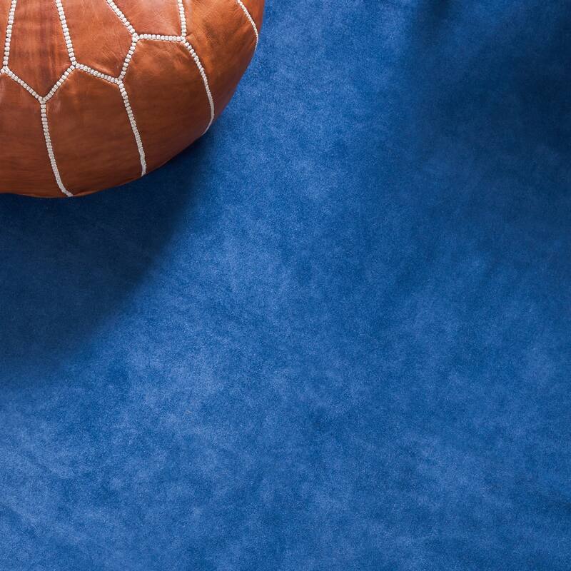 SAFAVIEH Handmade Cow Hide Radomila Cabin & Lodge Rug