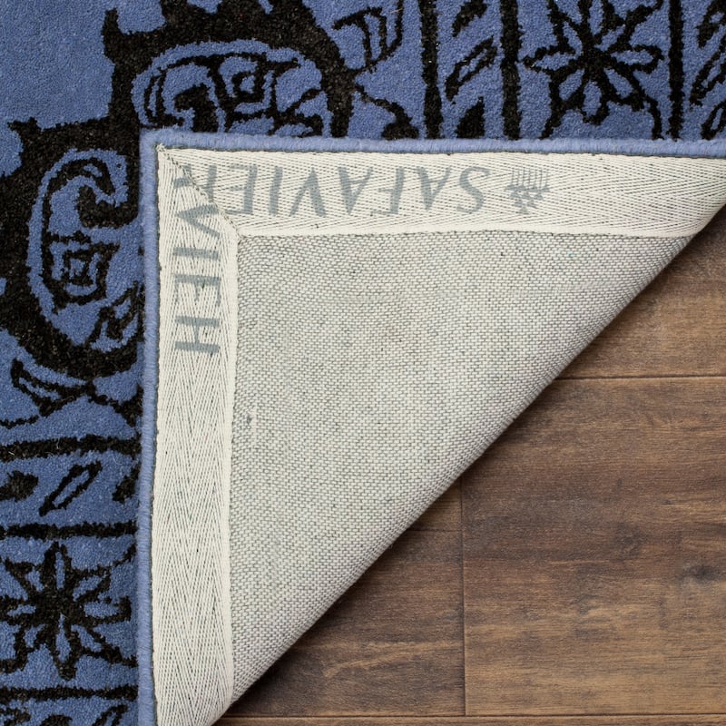 SAFAVIEH Handmade Glamour Gudmundina Modern Viscose Rug