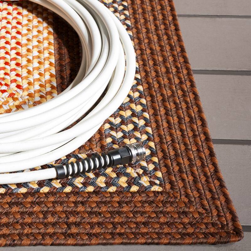 SAFAVIEH Handmade Braided Tomislava Country Rug