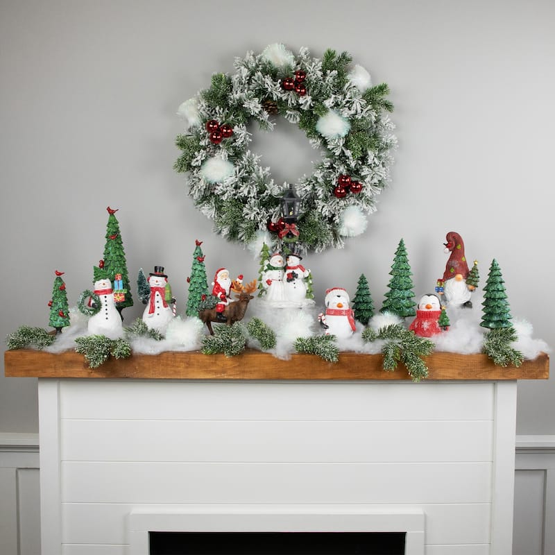 Santa Claus on a Reindeer Holding a Frosted Pine Tree Christmas Figurine - 8.25"