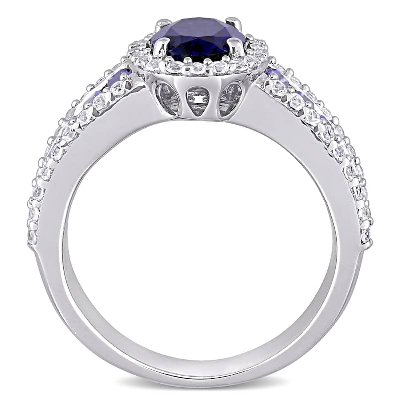 Oval & Baguette-cut Created Blue and White Sapphire Halo Engagement Ring in Sterling Silver by Miadora