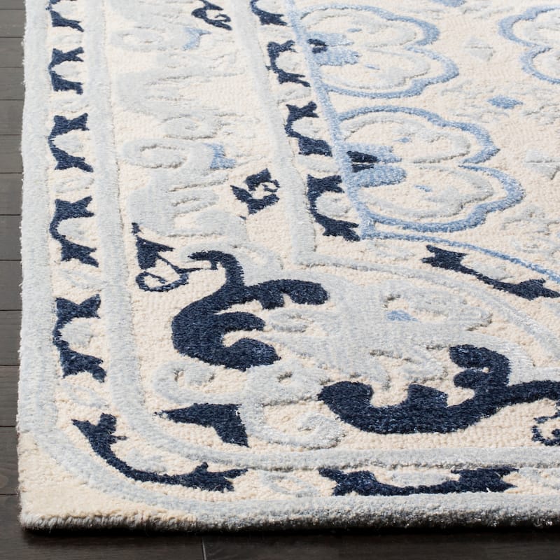 SAFAVIEH Handmade Bella Nursel Modern Floral Wool Rug