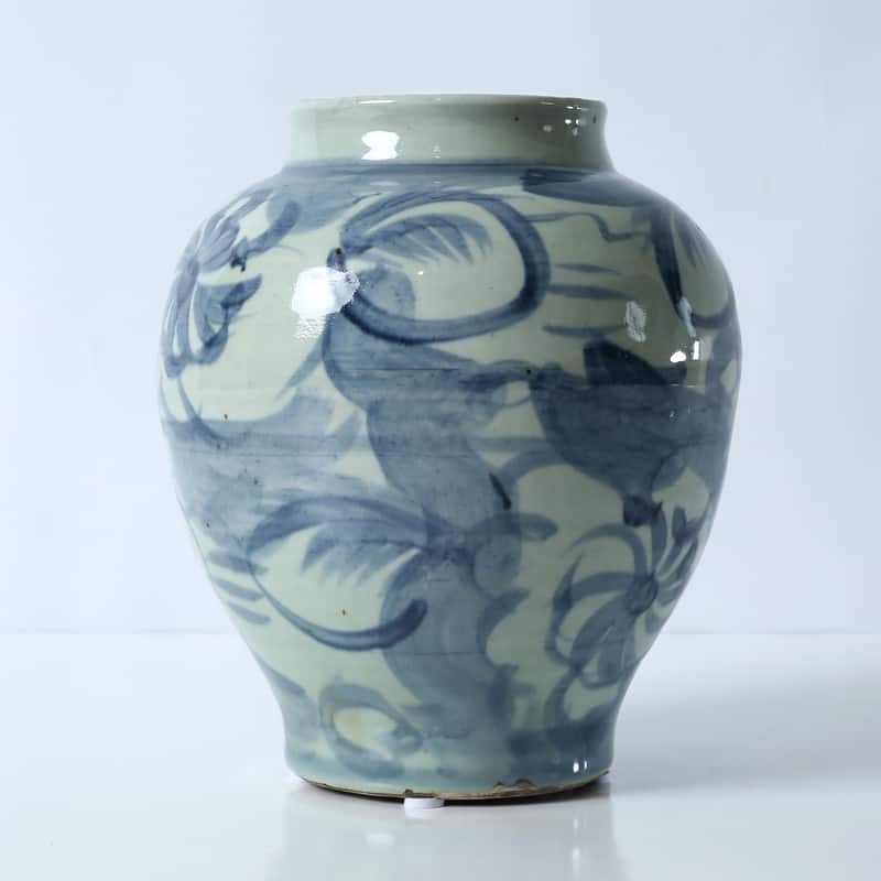 Approx. 10" High Blue and White Jar with Flower Motif