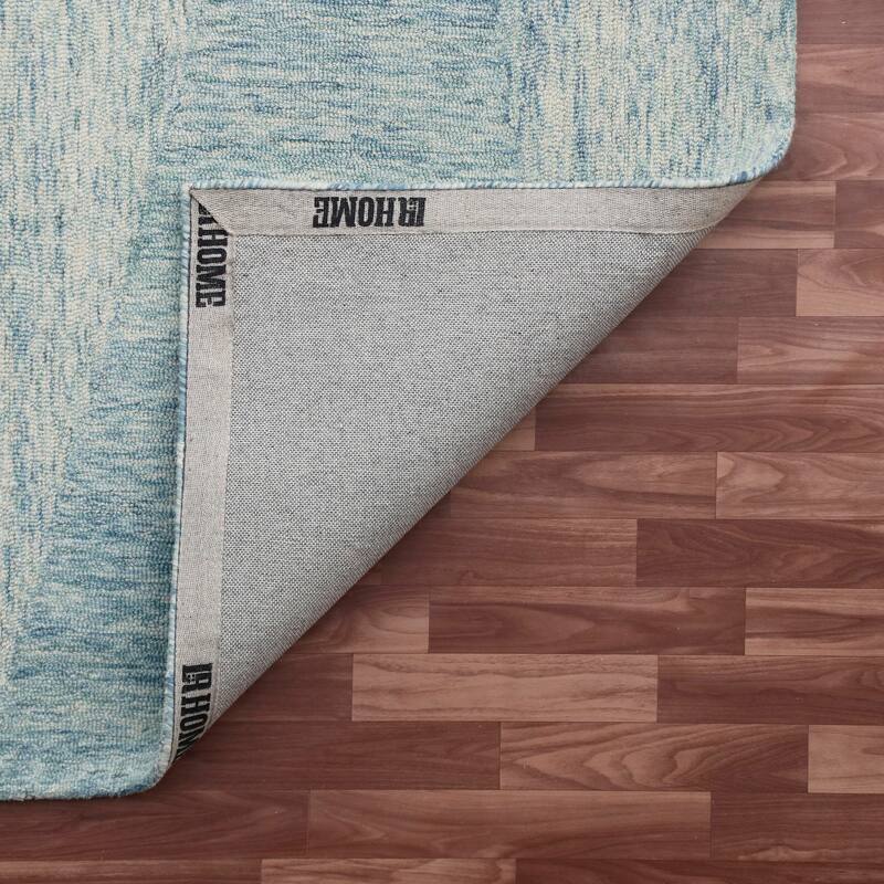 Sevita Abstract Hand-Tufted Wool Area Rug