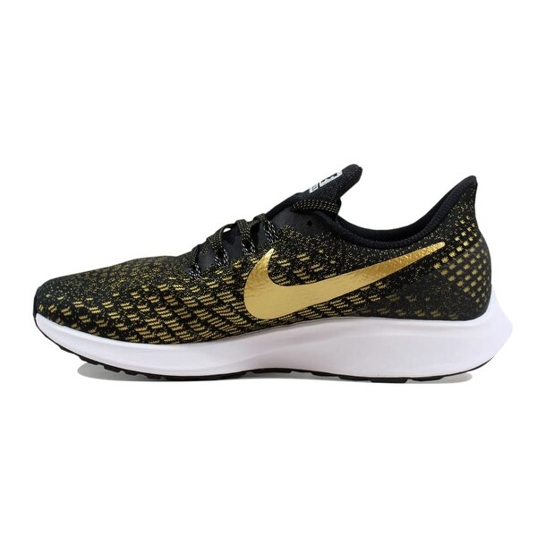 nike pegasus gold black