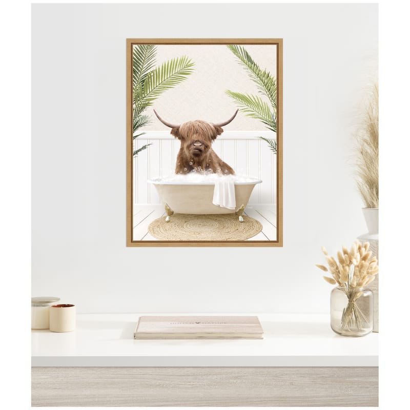 Kate and Laurel Sylvie Highland Cow in Palm Bathtub Framed Canvas by Amy Peterson