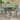 Cyprus Gray Round Outdoor Bar Table with Ice Bucket and Umbrella Hole
