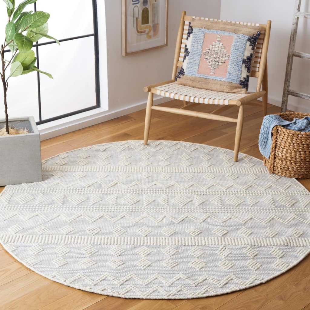 SAFAVIEH Handmade Natura Miradie Wool Braided Tassel Rug