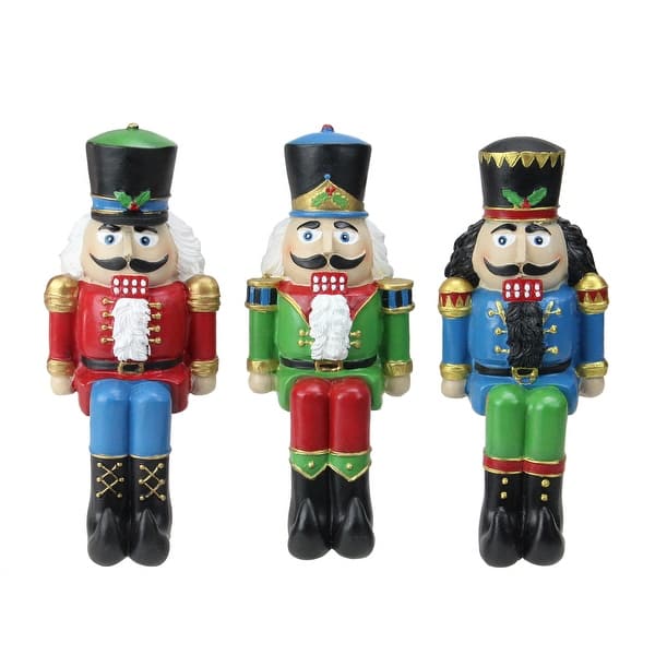 slide 2 of 5, Set of 3 Red, BlueGreen Nutcracker Christmas Stocking Holders 7.5"