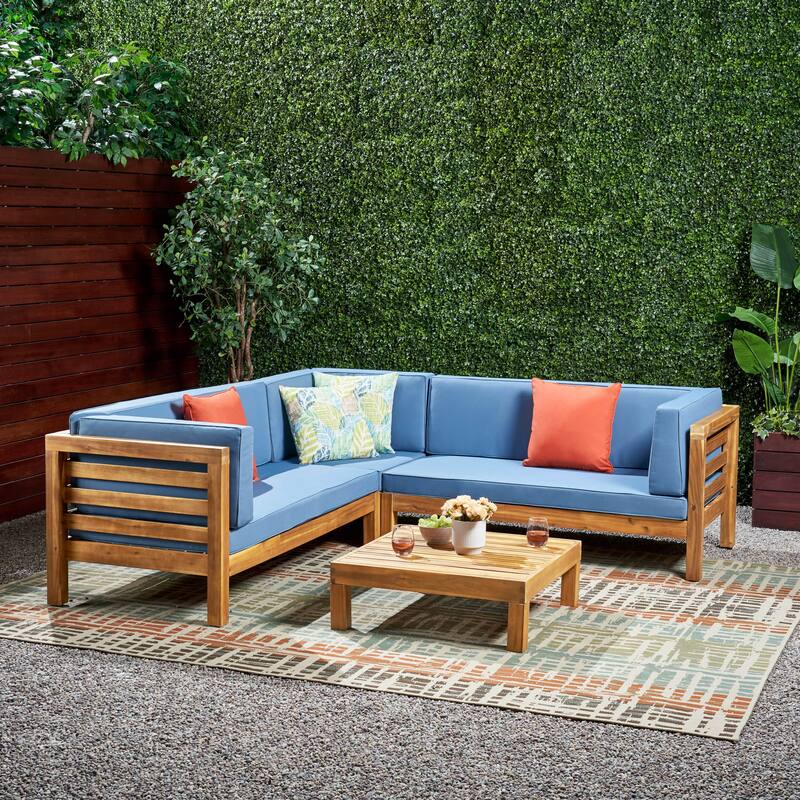 Oana Outdoor 5 Seater V Shaped Mid-Century Modern Acacia Wood Sectional Sofa Set with Coffee Table by Christopher Knight Home - Blue