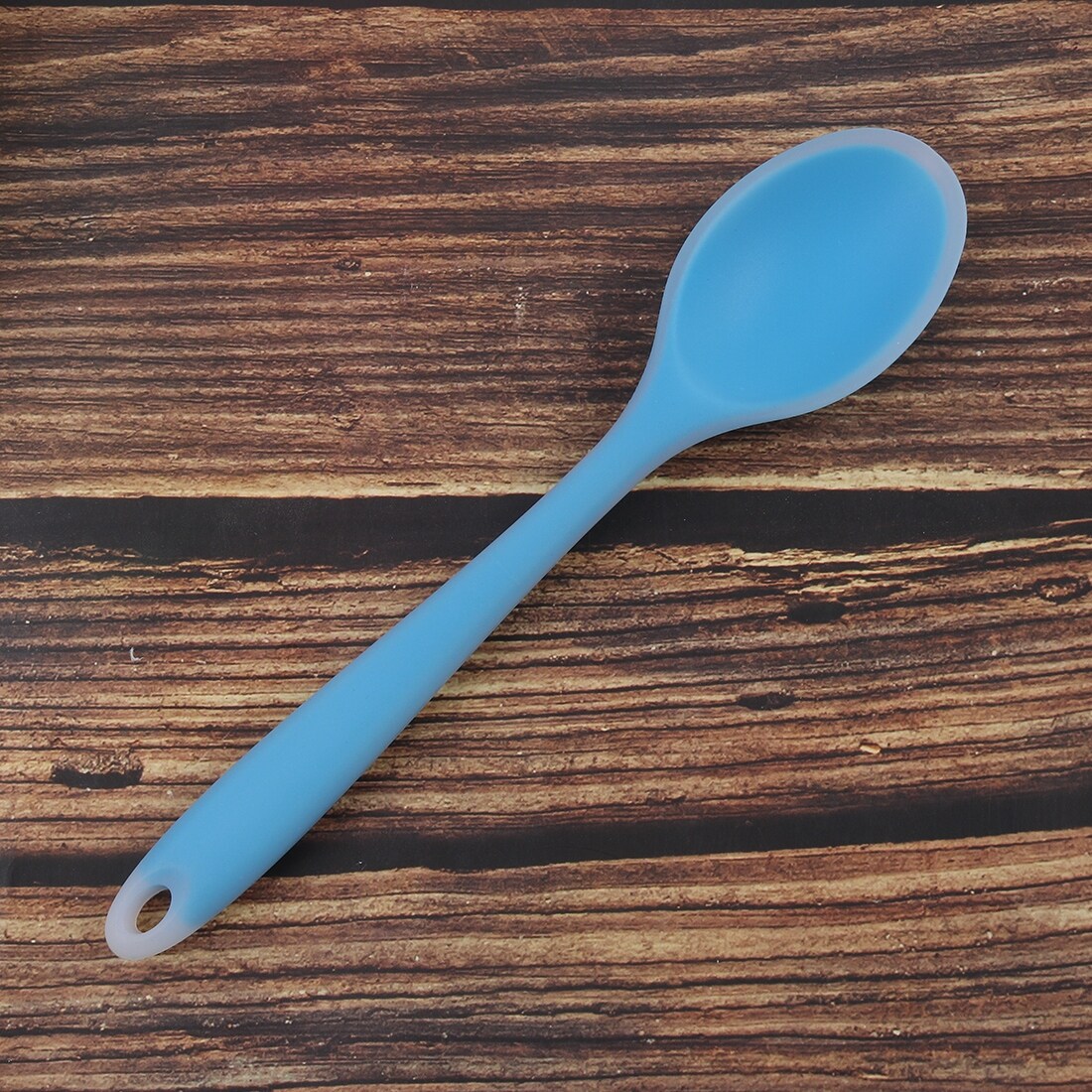 https://ak1.ostkcdn.com/images/products/is/images/direct/e6fa69e4ff9316ec131599afef73df3765a9975c/Silicone-Dinner-Dessert-Spoon-Serving-Eating-Utensil.jpg