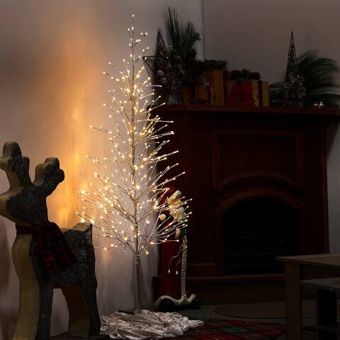 Alpine Corporation 65"H Indoor/Outdoor Pre-Lit Silver Foil Christmas Tree with Yard Stake and 360 LED Lights