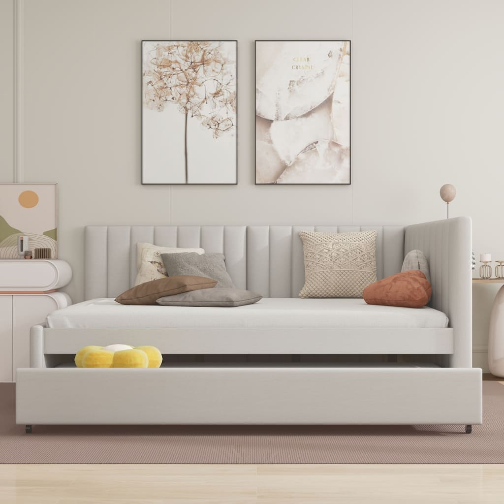 Upholstered sofa bed with trundle