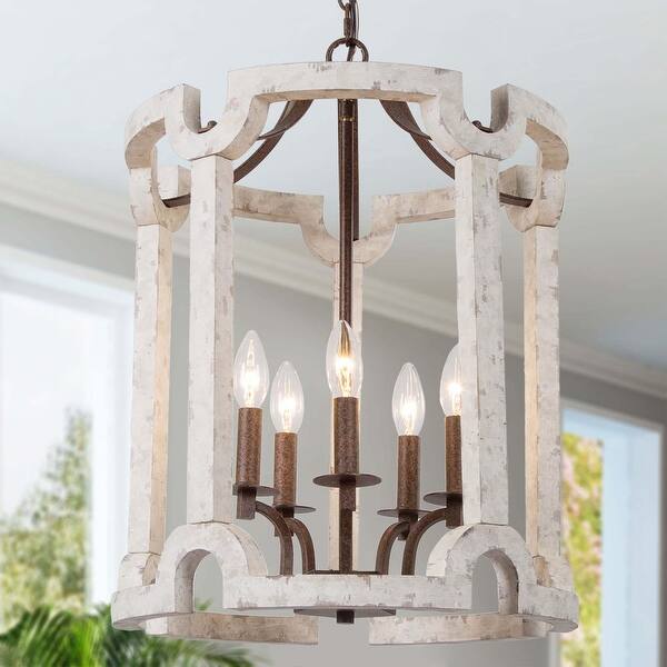 Featuring ivory white shabby chic transitional style with candelabras, this farmhouse chandelier adds welcoming light in any style room. usd