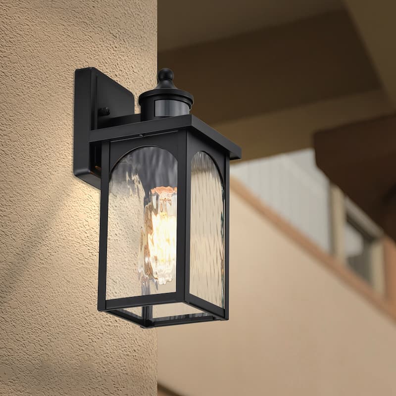12 in. 1-Light Matte Black Motion Sensing Dusk to Dawn Outdoor Hardwired Wall Lantern Sconce with Clear Water Wave Glass