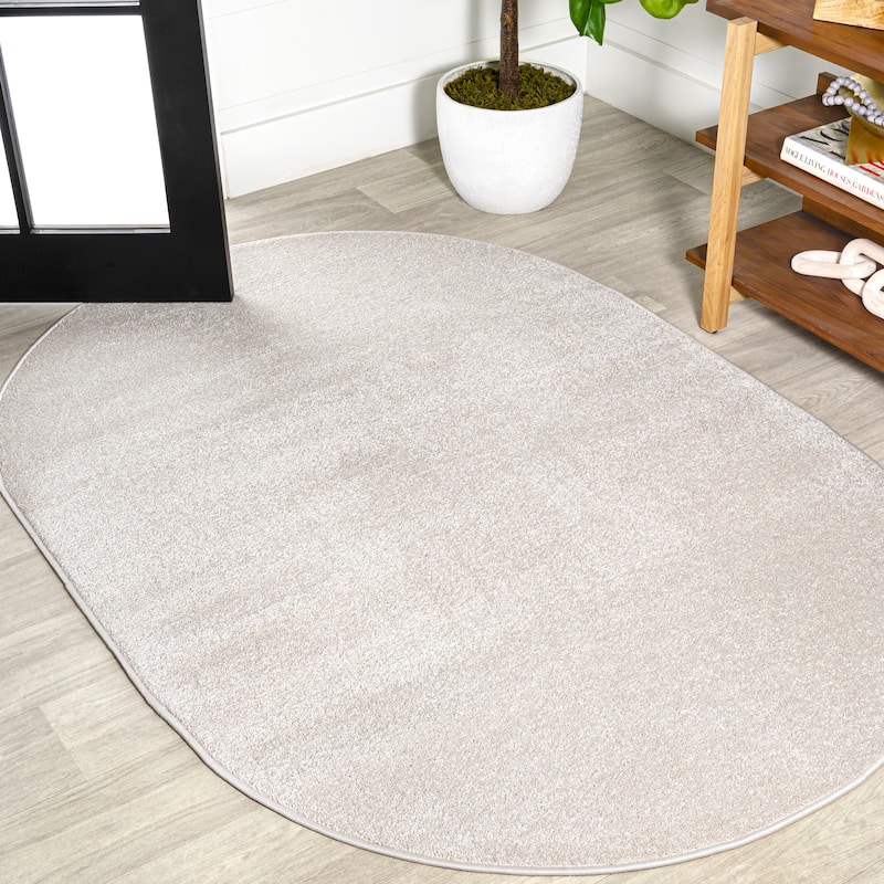 JONATHAN Y Tumbling Solid Low-Pile Area Rug - 6 X 9 Oval - Ivory
