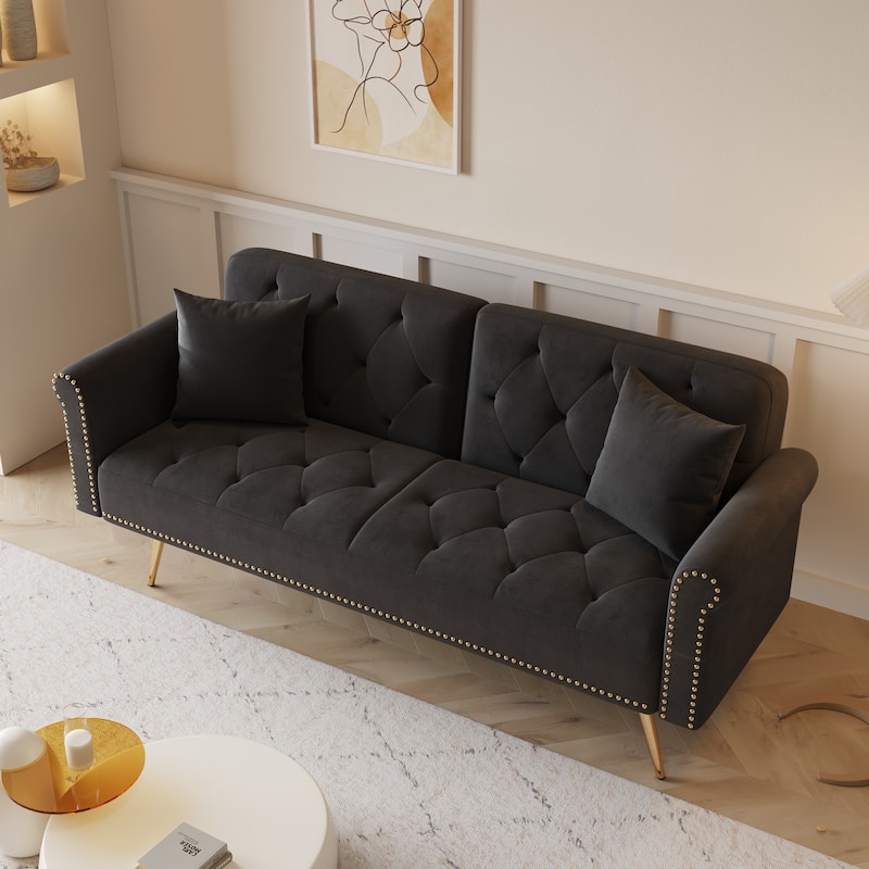 A 69.7-Inch-Long Sofa Bed Covered In Velvet Fabric, Featuring Nail Head Trim And Accompanied By A Matching Throw Pillow
