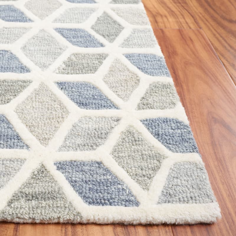 SAFAVIEH Handmade Ebony Yulia Modern Wool Rug