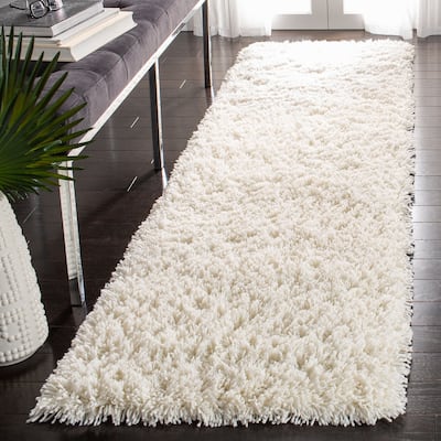 SAFAVIEH Handmade Classic Shag Nakhshun Rug