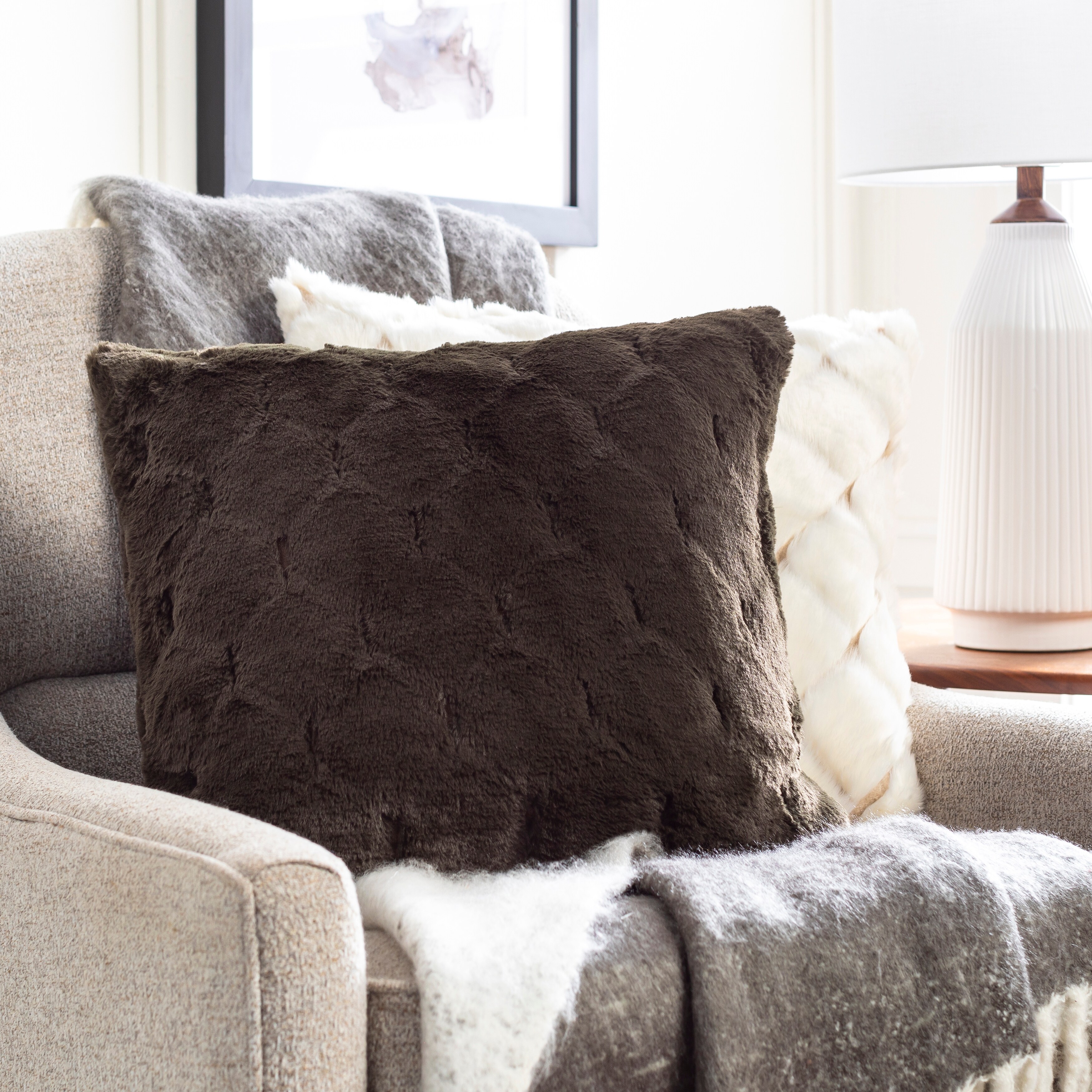https://ak1.ostkcdn.com/images/products/is/images/direct/e802e2302b7ee19a1d055a701f0bcc74d9363cc8/Macie-Faux-Fur-Cozy-Modern-Throw-Pillow.jpg